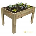 Mesa de cultivo elevada de madera natural con texto en el lateral.