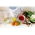 MioMat con verduras frescas, frutas, jugos y leche vegetal en el mostrador de la cocina. MioMat con verduras frescas, frutas, jugos y leche vegetal en el mostrador de la cocina.