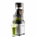 Un exprimidor Kuvings CS600 que vierte zumos verdes en un vaso alto.