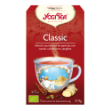 Caja clásica de Yogi Tea con arte en forma de taza de té, que presenta canela sobre un fondo rojo intenso.