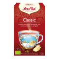 Caja clásica de Yogi Tea con arte en forma de taza de té, que presenta canela sobre un fondo rojo intenso.