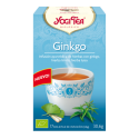Caja de Té Ginkgo Yogi con taza de té azul y hojas verdes, promoviendo el bienestar.