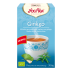 Caja de Té Ginkgo Yogi con taza de té azul y hojas verdes, promoviendo el bienestar.