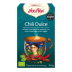 Infusión de sabores: Caja Yogi Tea Chili Dulce con diseño de taza con retrato de mujer.