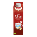 Caja roja de té Yogi Chai con imagen de taza, infusionado con jengibre y canela.