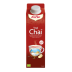 Caja roja de té Yogi Chai con imagen de taza, infusionado con jengibre y canela.