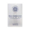 Caja con la leyenda "Ibiza y Formentera Agua de Mar", con un logo náutico para bebidas hipertónicas.