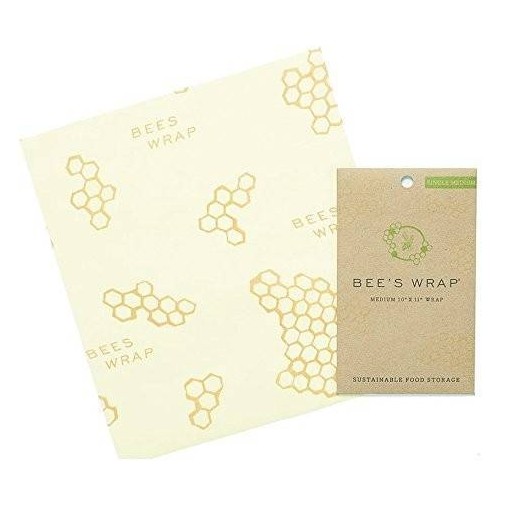 Bee's Wrap: envoltorio ecológico con cera de abeja y patrones de panal sobre fondo blanco.