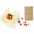 Envoltorio de cera de abejas con surtido de tomates cherry y embalaje ecológico Bee's Wrap.