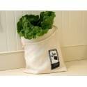 Una Vejibag con lechuga verde fresca en su interior.