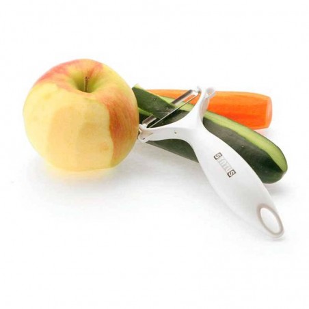 manzana pelada con el Pelador de frutas y verduras - Status