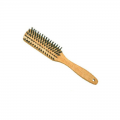Cepillo de madera natural con cerdas de jabalí para cabello.