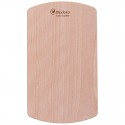 Tabla de cortar de madera de haya colocada de forma vertical