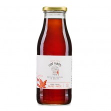 Botella de vidrio de jarabe de arce orgánico con etiqueta blanca y diseño de hoja de arce roja.