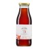Botella de vidrio de jarabe de arce orgánico con etiqueta blanca y diseño de hoja de arce roja.