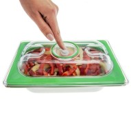 La Tapa de vacío GN 1/4 Status accionando la válvula para permitir la apertura de la cubeta