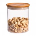 Tarro de vidrio de borosilicato con tapa de bambú mediano trendglas Jena con pistachos en su interior
