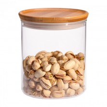 Tarro de vidrio de borosilicato con tapa de bambú mediano trendglas Jena con pistachos en su interior