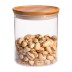 Tarro de vidrio de borosilicato con tapa de bambú mediano trendglas Jena con pistachos en su interior