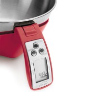 Báscula de cocina digital roja con bol de acero inoxidable que muestra una lectura de 482 gramos.