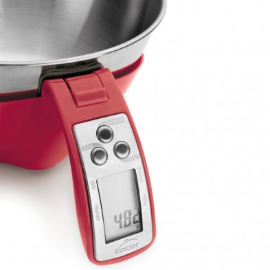 Báscula de cocina digital roja con bol de acero inoxidable que muestra una lectura de 482 gramos.