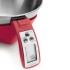Báscula de cocina digital roja con bol de acero inoxidable que muestra una lectura de 482 gramos.