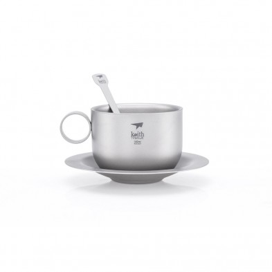 Taza de plata con asa, cuchara a juego y platillo, todo ello con la marca Keith Titanium