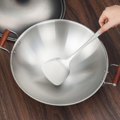 La Espátula de titanio Keith sobre el wok de titanio keith, no incluido La Espátula de titanio Keith sobre el wok de titanio keith, no incluido