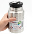 Termo de acero inoxidable con cuchara Biodora de 500 ml sostenido en la mano Termo de acero inoxidable con cuchara Biodora de 500 ml sostenido en la mano