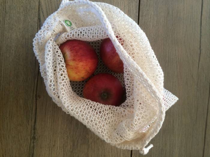manzana en bolsa de algodón orgánico